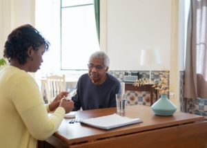 woman discussing pill uses with patient